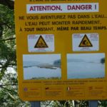 Waarschuwing voor snel stijgend water in de rivier.