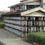 Stevige balken voor de waterkering in Genemuiden